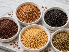 Bowls of assorted untreated microgreen seeds