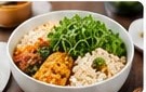Rice bowl topped with microgreens